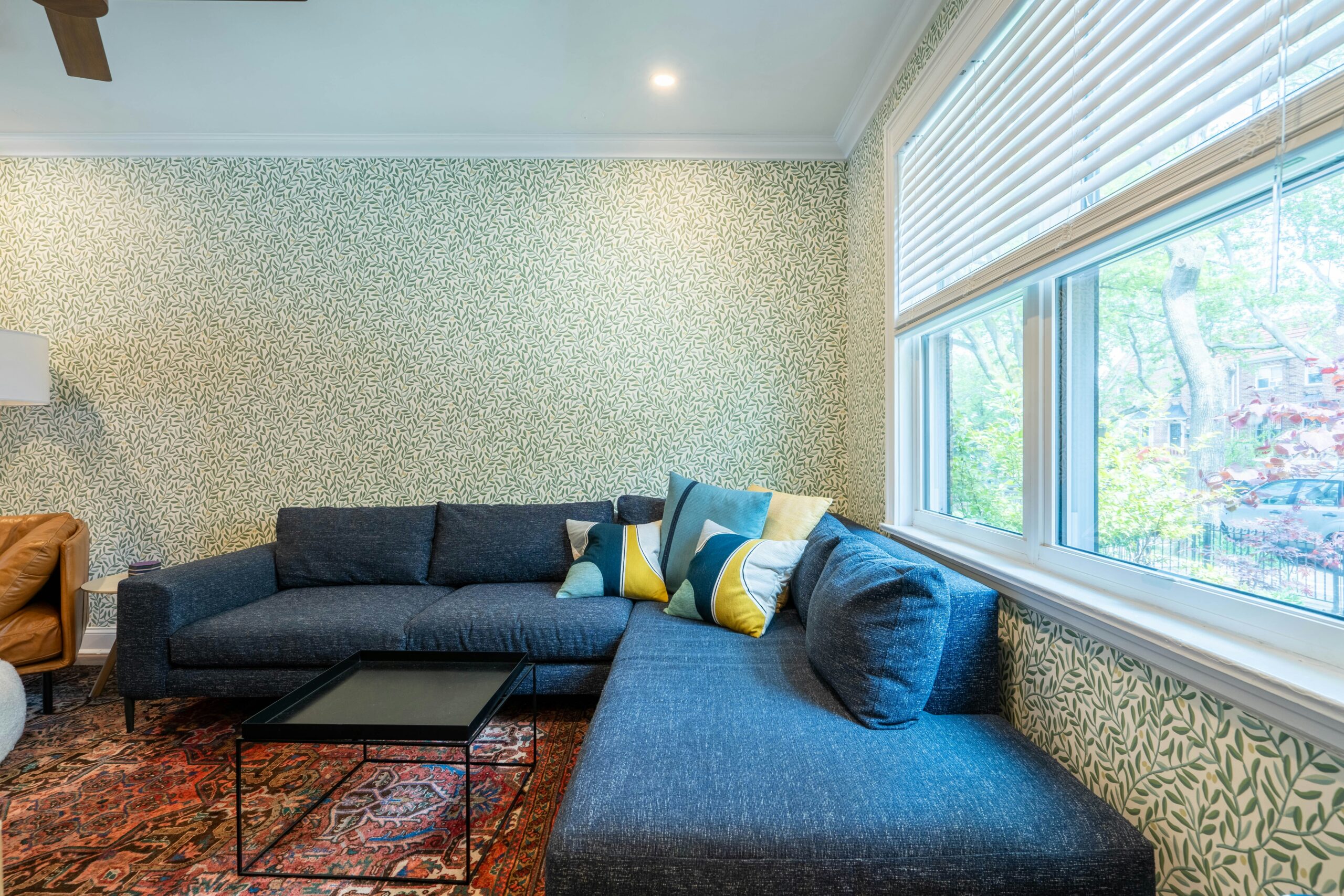 Sunlight filtered through adjustable Roman curtain fabric folds